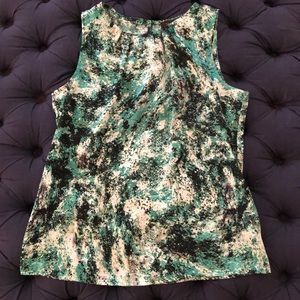 Limited silky, sleeveless work blouse